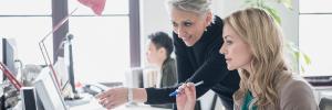 Female colleagues collaborating in the workplace 