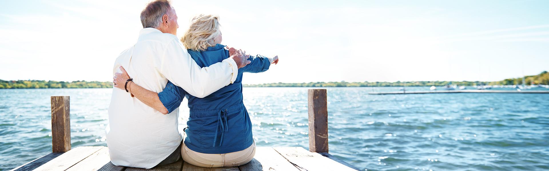 Elderly couple on a pier Elderly couple on a pier