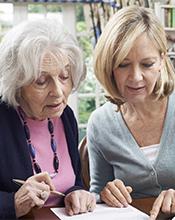 Woman offering aged care support