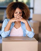 Young woman moving house