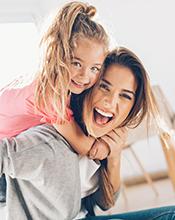 Young mother and her daughter Young mother and her daughter