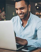 Male researcher on his laptop Male researcher on his laptop