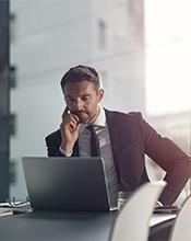 Man accessing data on his laptop