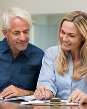 Couple examining pension options