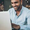 Man accessing data on his laptop