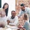 Researchers collaborating in the workplace 