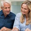 Couple examining pension options