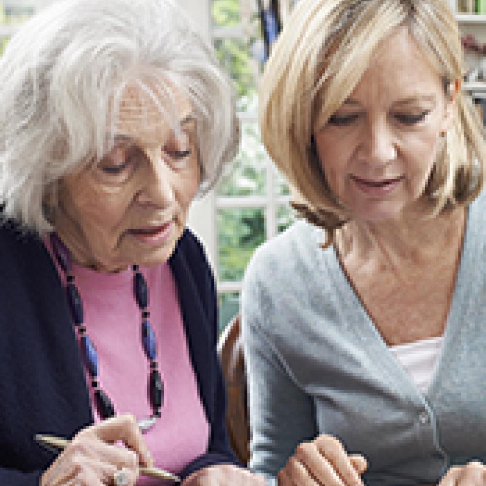 Woman offering aged care support