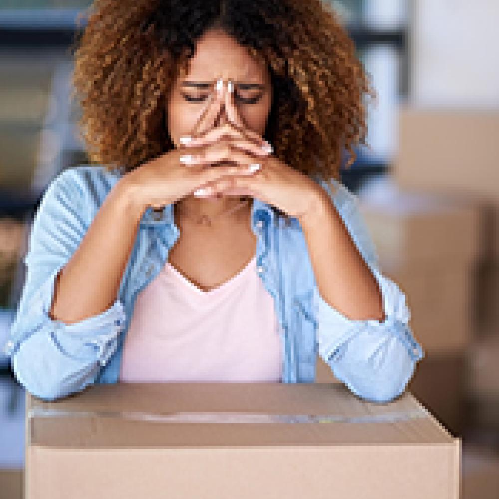 Young woman moving house