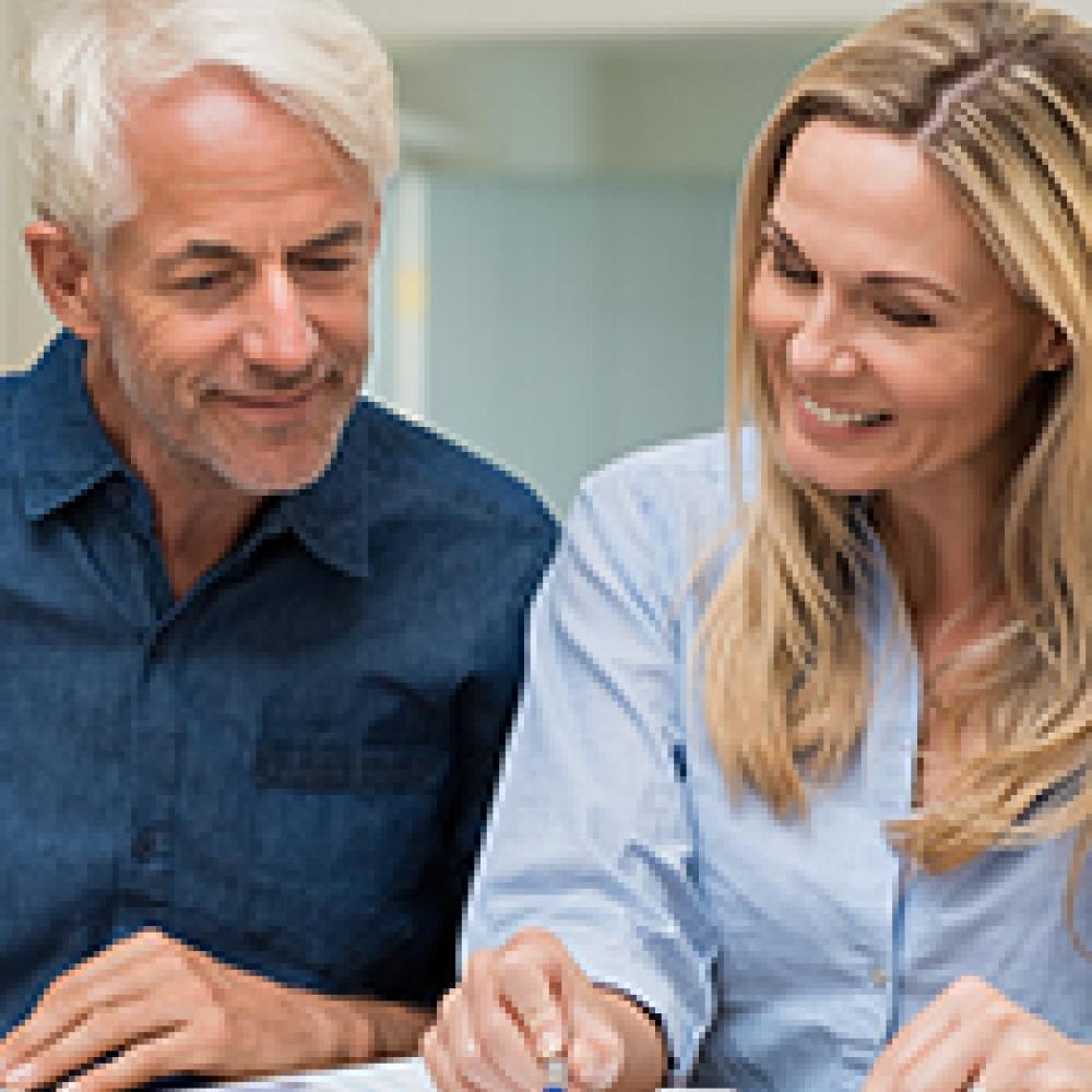 Couple examining pension options